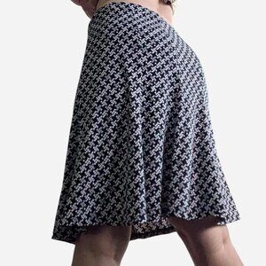 Vintage patterned white and black knee length skirt